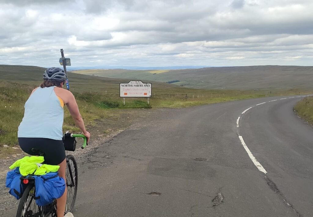 person cycling in Northumberland, England